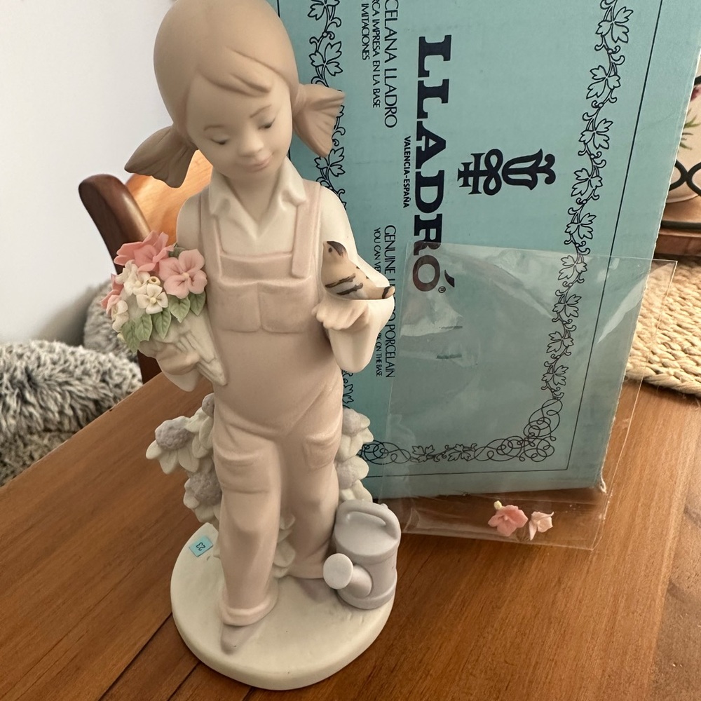 Lladro Figurine of Girl with Flowers and Bird